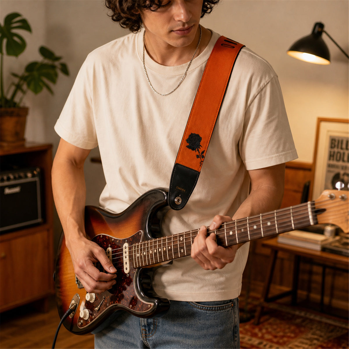 OMORA Rose Reversible Strap in a warm music lifestyle setting.