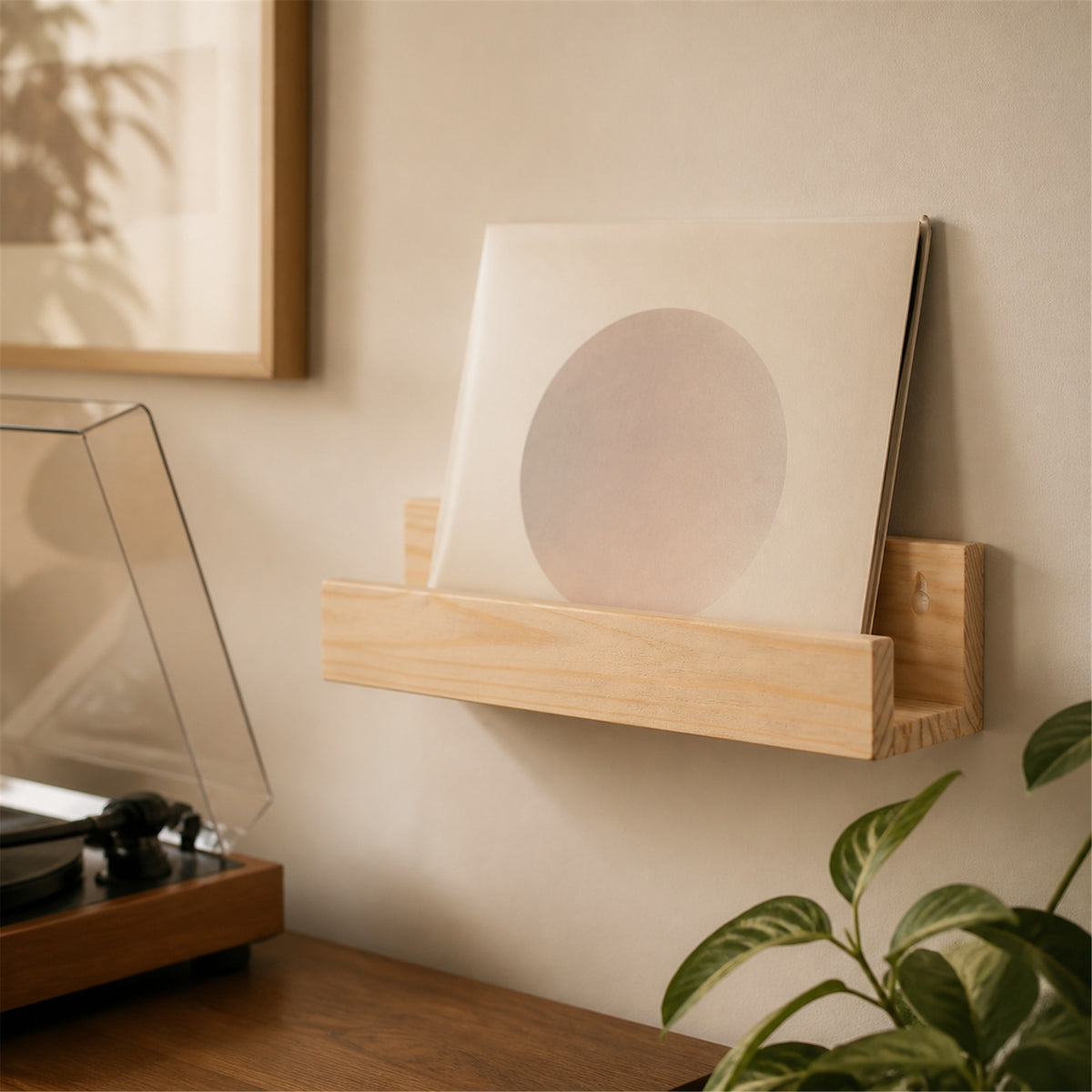 OMORA Vinyl Display Rail in a warm music lifestyle setting.